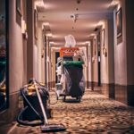 black and gray stroller on hallway